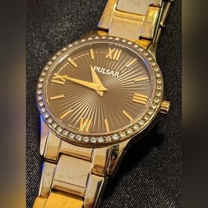 Pulsar Women's Quartz Watch Textured Brown Face Crystal Set Bezel Gold Tone